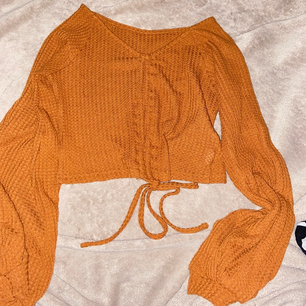 brown flowy blouse.